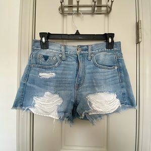Distressed light wash jean shorts